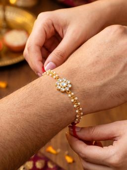 LUCKY JEWELLERY - Rakhi for Bhaiya/Bhabhi Red Thread Raksha Bandhan Rakhi (Pack of 1)