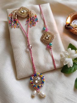 NVR - Multi-Color Artificial Stones Golden Toned Bhaiya Bhabhi Rakhis (Pack of 2)