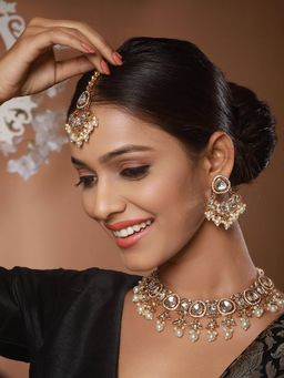 Aatmana - Gold-Plated Kundan Studded Beaded Necklace with Earrings and Maang Tikka