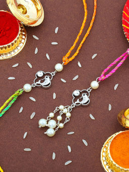Estele - Rhodium Plated Dolphin Rakhi for Bhaiya Bhabhi with Multi Coloured Thread