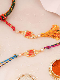 Estele - Gold Plated Om Rakhi for Bhaiya Bhabhi with Red Enamel, Pearls & Silk Thread