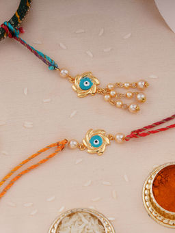 Estele - Gold Plated Sudarshan Chakra Design Bhaiya Bhabhi Rakhi with Silk Thread