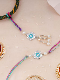 Estele - Rhodium Plated Sudarshan Chakra Design Bhaiya Bhabhi Rakhi with Silk Thread