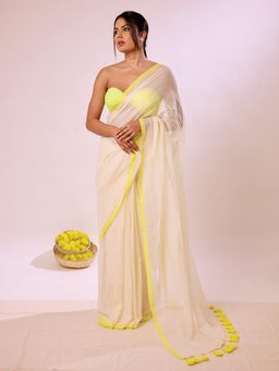 Aparna - Cream Soft Mul Cotton Saree With Neon Yellow Border And Tassel Pallu For Women