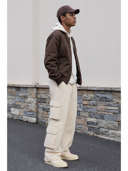 FREAKINS - Men Beige Solid Loose Fit Jeans