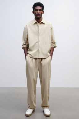 H&M - Men Beige Relaxed Fit Trousers