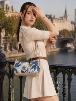 Caprese - Beige Embroidered Faux Leather Sling bag (Medium)