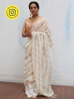 Chidiyaa - Onam Devaki Handwoven Linen Zari Saree