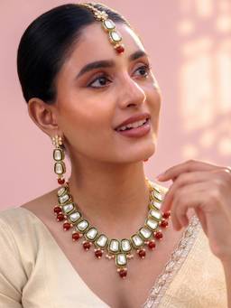 Peora - Gold Plated Traditional Kundan Necklace with Green Stones Earrings and Maang Tikka