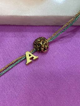 Digital Dress Room - Letter A Lion Charm Thread Rakhi