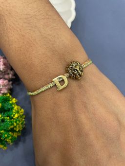 Digital Dress Room - Letter D Lion Charm Thread Rakhi