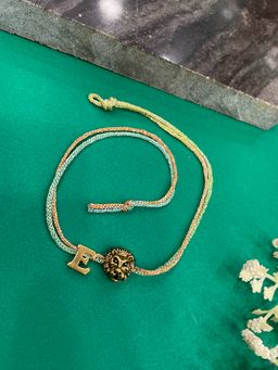 Digital Dress Room - Letter E Lion Charm Thread Rakhi