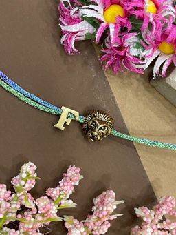 Digital Dress Room - Letter F Lion Charm Thread Rakhi