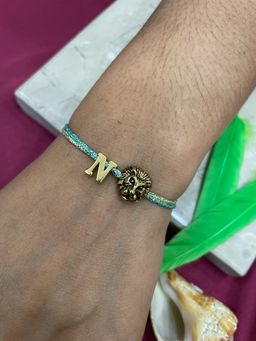 Digital Dress Room - Letter N Lion Charm Thread Rakhi