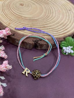 Digital Dress Room - Letter R Lion Charm Thread Rakhi