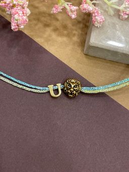 Digital Dress Room - Letter U Lion Charm Thread Rakhi