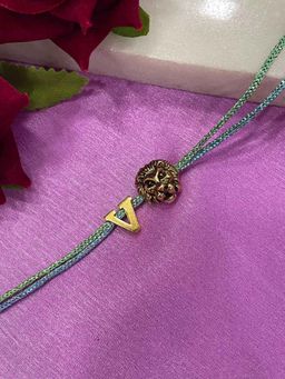 Digital Dress Room - Letter V Lion Charm Thread Rakhi