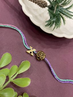 Digital Dress Room - Letter X Lion Charm Thread Rakhi