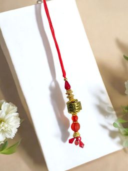 Accessher - Gold Intricate Lumba Rakhi Gifting with Roli Kumkum Packets & Raksha Bandhan Card