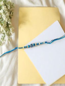 Accessher - Evil Eye Blue Rakhi Gifting with Roli Kumkum Packets & Raksha Bandhan Card