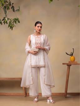 Bani Women - White Embroidered Sleeveless Straight Kurti with Pant and Dupatta
