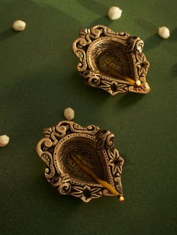 DecorTwist - Designer Peacock Swastik Diya