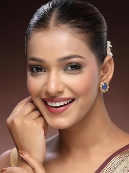 ADIVA - Antique Gold-Plated Blue Sapphire Stone Oval Stud Earrings with Textured Floral Design