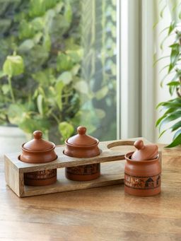 ExclusiveLane - Warli Village Tales' Ceramic Pickle Jar with Wooden Holder (Set of 4)