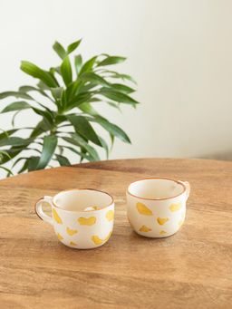ExclusiveLane - Hand-Embossed Peek-A-Boo Ceramic Tea & Coffee Mugs (Pack of 2)