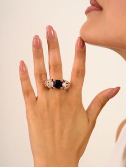 METALM - Rose Gold Plated Leopard Ring With Eye-Catching Blue Cz Diamond