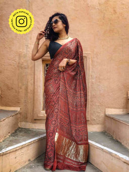 Sundarii - Maroon Ajrakh Floral Printed Modal Silk Saree With Unstitched Blouse
