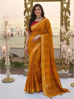Nyri - Mustard Ethnic Motifs Beads and Stones Georgette Saree with Unstitched Blouses
