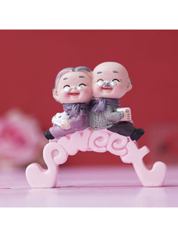 eCraftIndia - Cute Old Couple Statue Sitting on Sweet Stand Decorative Multi-Color