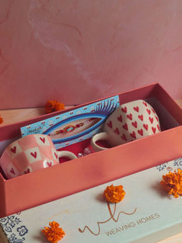 WEAVING HOMES - Heart & Chequered Heart Coffee Mug & Rakhi