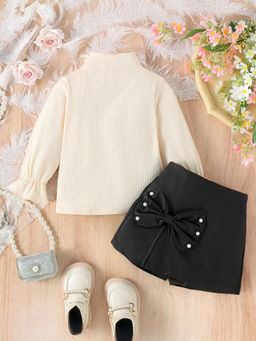 Hopscotch - Girls Cream and Black Textured Blouse and Skorts Set with Bow Applique (6-12 Months)