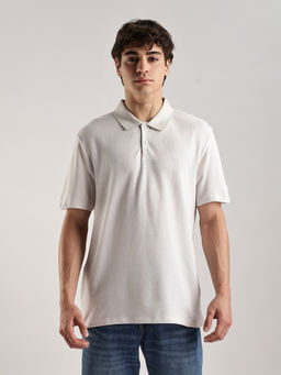Calvin Klein - Solid Regular-Fit Cotton Polo T-Shirt Off White