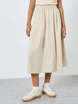 Styli - Women's Beige Solid Elastic Waistband A-Line Midi Skirt