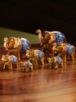 ExclusiveLane - 'Seven Tuskers In Brown' Hand Carved & Hand Painted Showpiece In Resin (Set of 7)