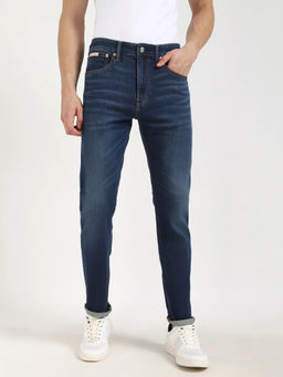 Calvin Klein - Blue Medium Wash Tapered Fit Mid Rise Jeans