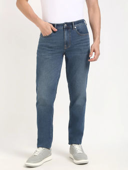 Calvin Klein - Blue Mid Wash Tapered Fit Mid Rise Jeans