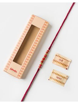 Fabindia - Women Red-Gold Thread Rakhi with Roli Chawal