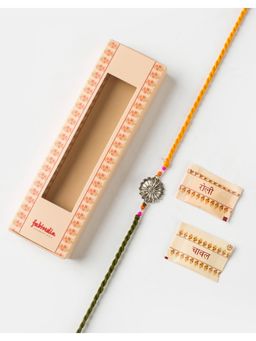 Fabindia - Women Silver Floral Thread Rakhi with Roli Chawal