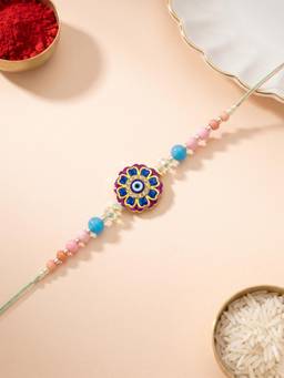ADIVA - Handmade Evil Eye Floral Thread Rakhi with Roli Chawal-Chandan-Mishri and Card