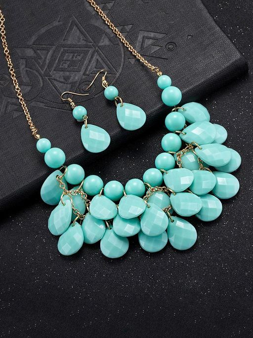 Yellow Chimes Blue Stone Tear Drop Designed Gold Toned Jewellery Set