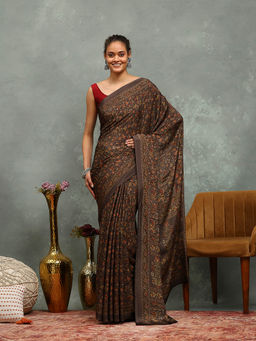 MEENA BAZAAR - Printed Brown Crepe Saree With Unstitched Blouse