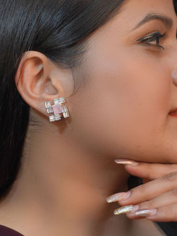 Niscka - Pink Stone Swastic Charm Studs