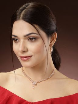NVR - Women Gold-Plated American Diamond Studded Handcrafted Jewellery Set