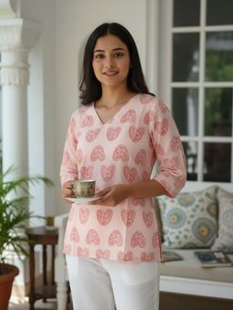 Surhi - Women Peach Printed Short Kurti