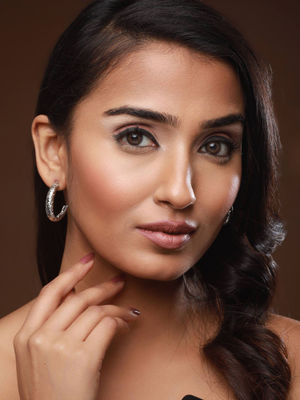 Aatmana Silver Plated Oval Textured Designer Hoop Earrings