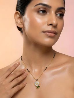 ADIVA - Gold Plated Mangalsutra with Black Beads and Cz Stone Floral Pendant with Green Leaf